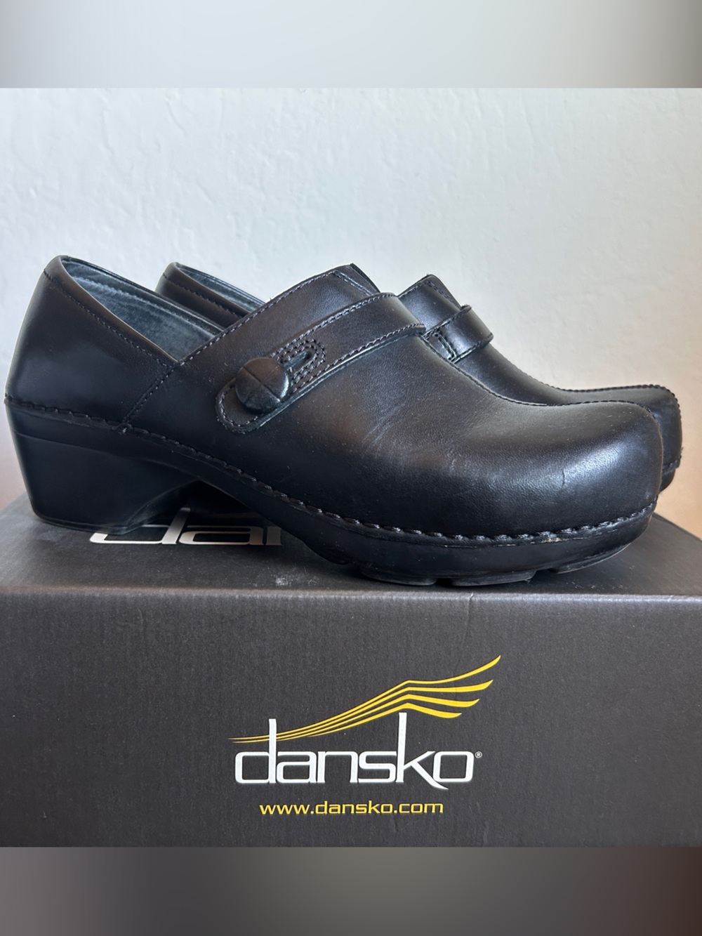 Dansko Black Leather Slip-On Clog